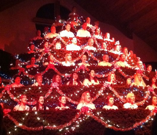 64 people perched high in this wonderful and amazing singing Christmas tree!
